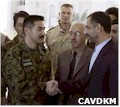 Colonel Sato, commander of Japan's SDF in As Samawah, shaking hands with CPA representative Jim Soriano. (Picture courtesy of the Royal Dutch Navy)